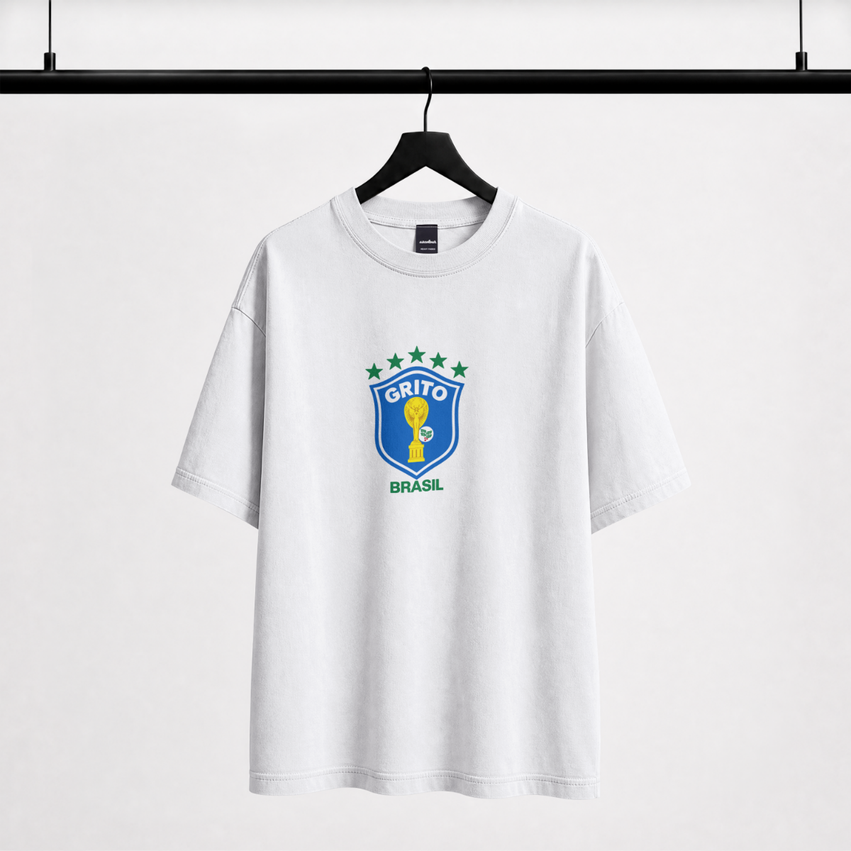 P10 Brasil white tee — front with GRITO Brasil trophy crest chest print